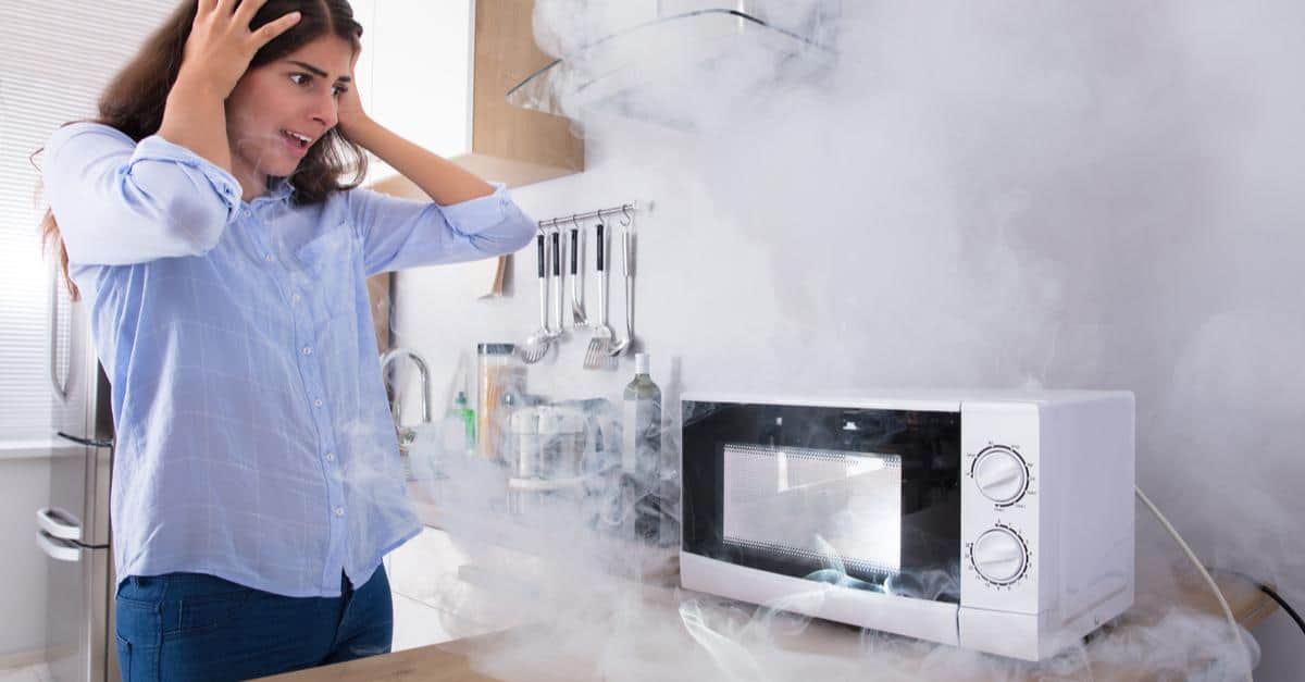 Photo of a smoking microwave oven