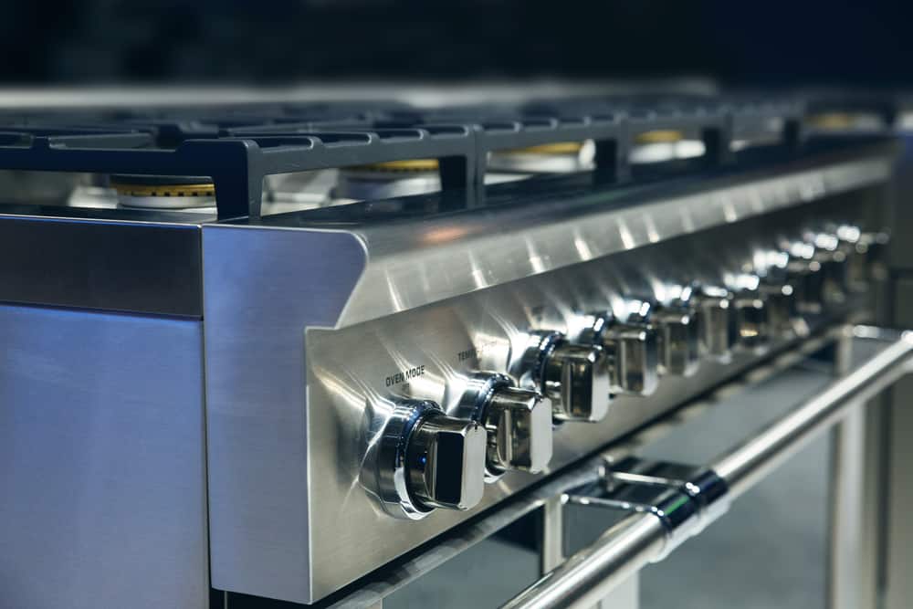 Photo of the range burners above a gas oven