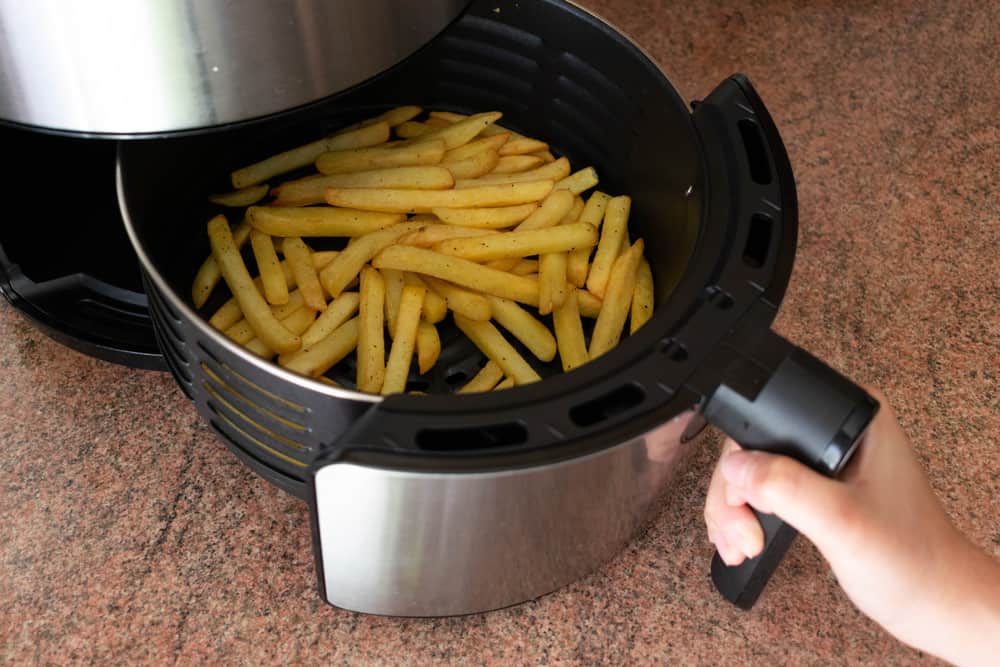 Photo of french fries in an air fryer