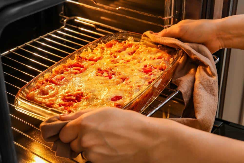 Photo of a Casserole Being Removed From the Oven