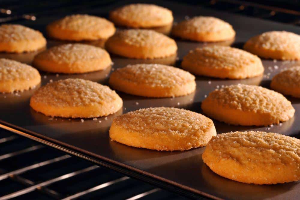Photo of Cookies on a Cookie Sheet in the Oven