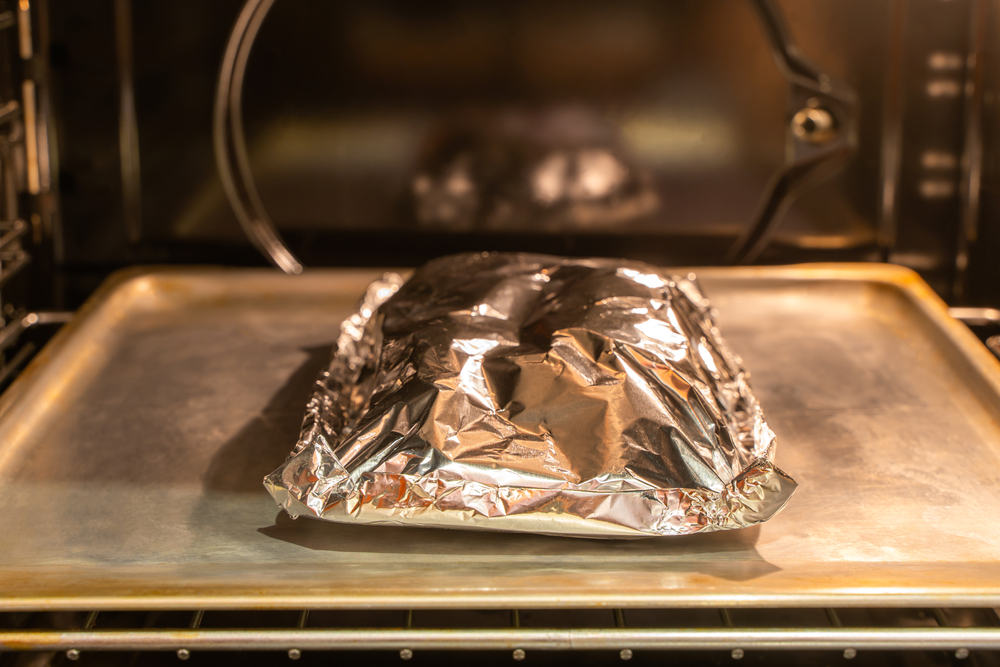 Photo of Cooking a Dish Covered at High Temps