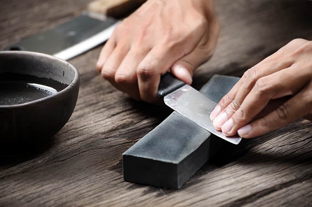Photo of Sharpening a Knife on a sharpening stone