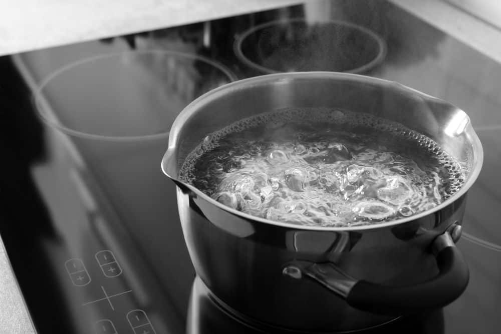 Photo of a pot without a lid boiling water