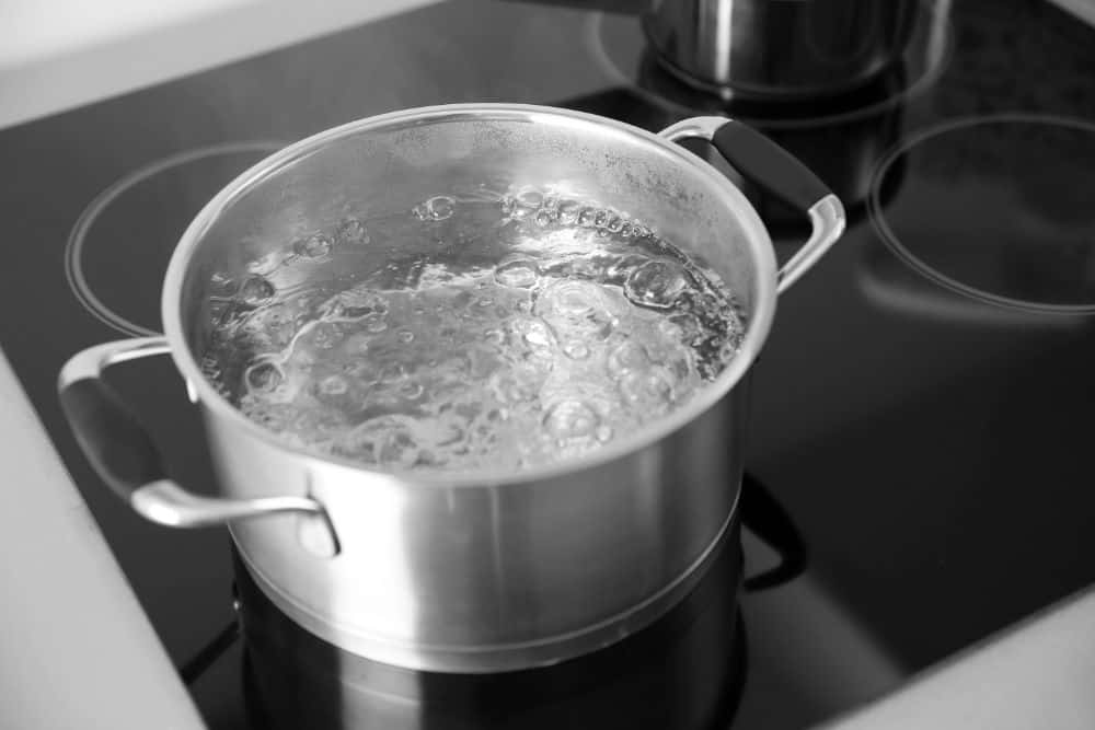 Photo of Boiling Water on a Stove